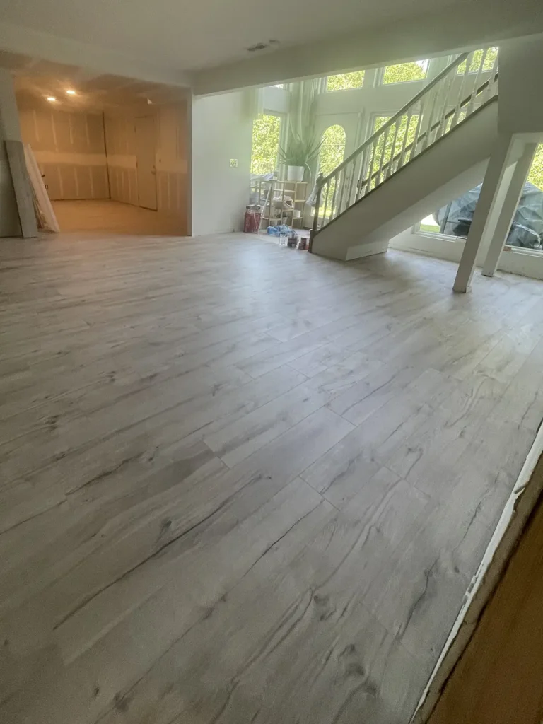 Rustic LVP flooring installed in a spacious family room.