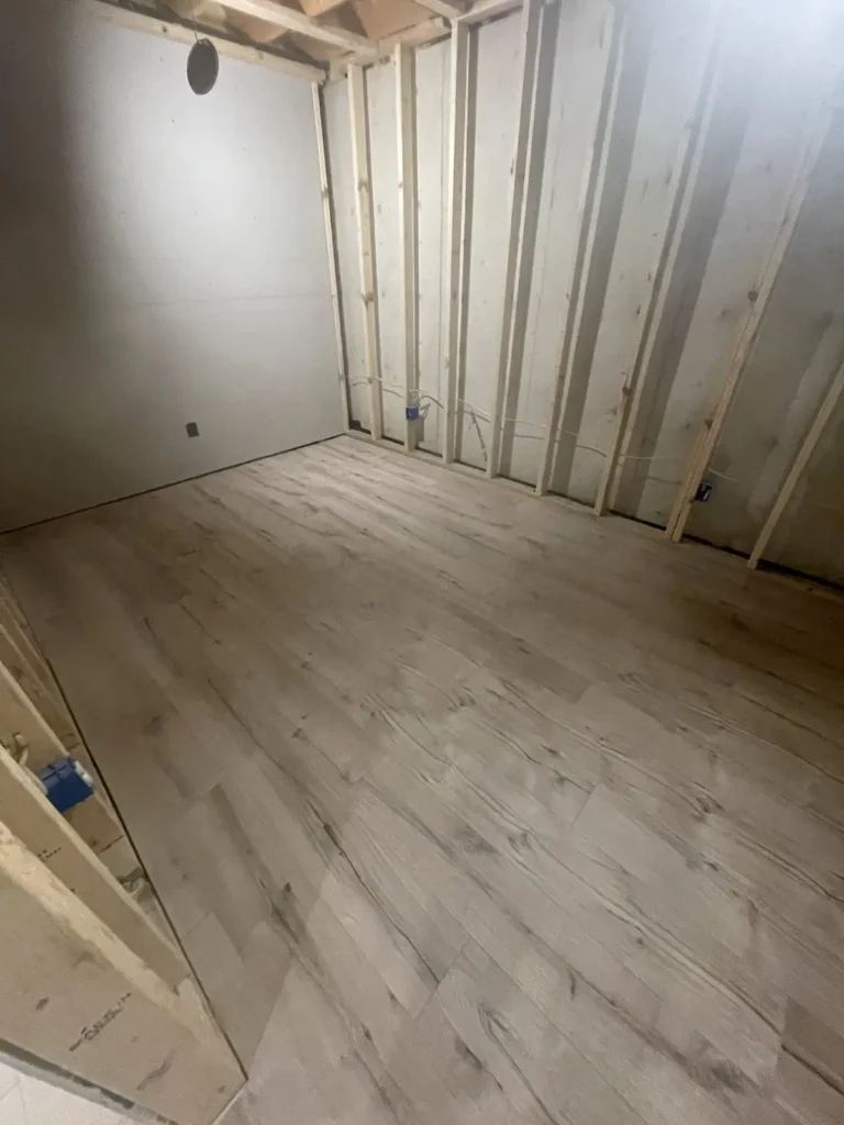 Luxury vinyl plank flooring enhancing a home office space.