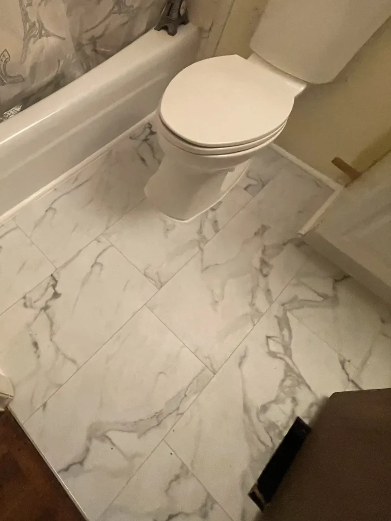 Water-resistant LVP flooring ideal for a home’s bathroom renovation.